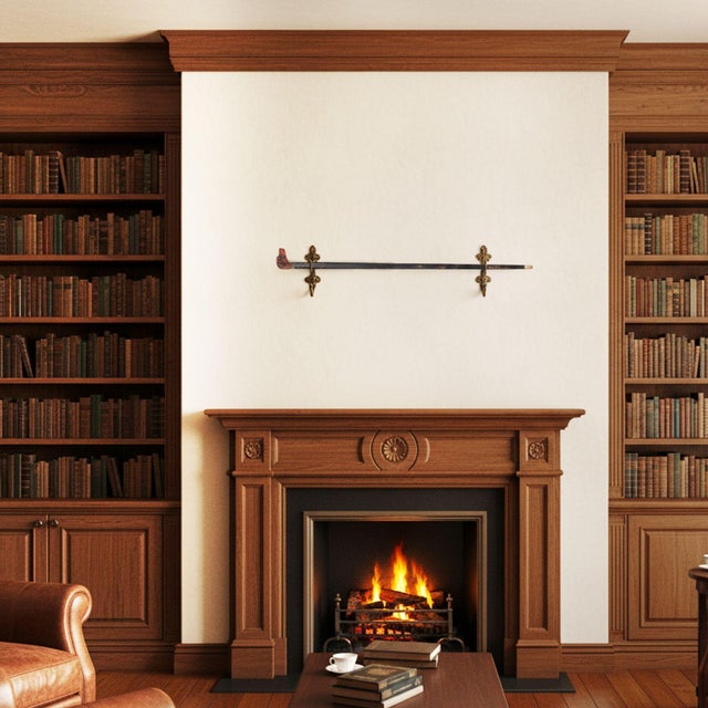 CARVED FOLK-ART DOG HEAD CANE OVER EBONIZED SHAFT Probably English, circa late 19th century 37 1/4: H x 2 7/8" W A very...