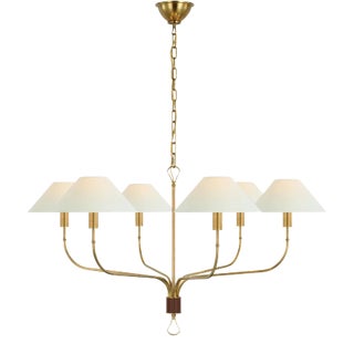 Amber Lewis for Visual Comfort Signature Griffin Grande Tail Chandelier in Hand-Rubbed Antique Brass and Saddle Leather with Linen Shades For Sale