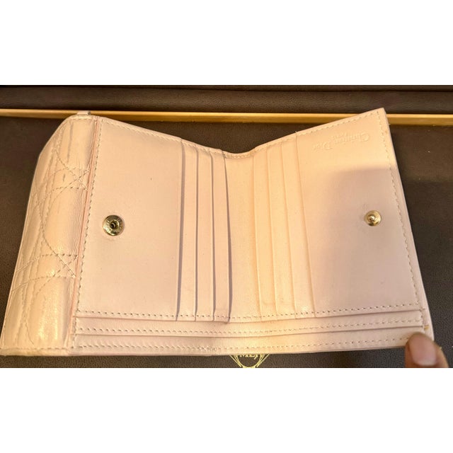DIOR Lady Dior Mini Wallet AUTHENTIC LADY DIOR MINI WALLET in beige colored lambskin with Cannage stitching. This...