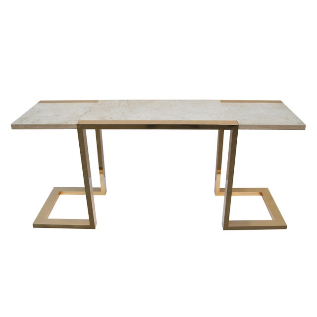 A Modernist console table by Alfredo Freda for Cittone Oggi. Patinated brass frame and travertine top.