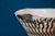 Textured, even striated, and beautifully graphic, this antique vase is a lovely decorative piece. Slightly corolla-shaped,...