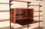 Designed by Kai Kristiansen for FM Møbler, this Danish Modern wall unit is crafted from richly grained rosewood solids and...