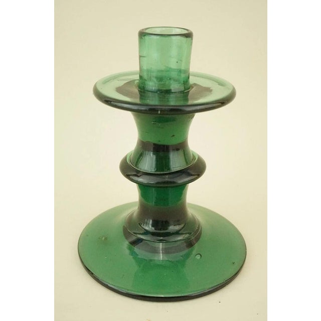 MEASUREMENTS: Height: 18 cm; Diameter: 13 cm; Weight: 0.871 kg Delicate Murano blown glass candlestick, entirely...