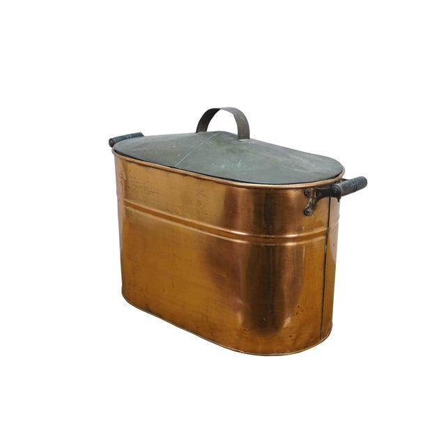 Antique copper boiler, firewood bin or wash tub with lid and turned wood handles. Dimensions: 23.5" x 11" x 17" (W x D x H)
