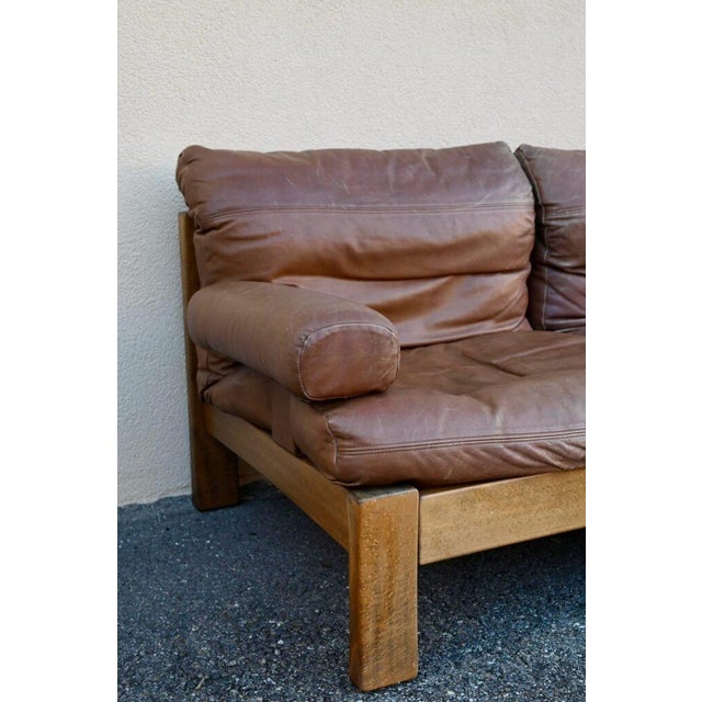 No fewer than 5 modules, a table, and several possible combinations make up this 1970s living room set. Upholstered in...