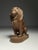 Large (probably) teak wood carving/sculpture of a lion in a seated position. Originating from Southeast Asia, late 20th...