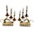 Two pairs of ornate fireplace mantles, each is a three-light candelabra white Bakelite, and brass table lamps. These...