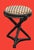 Fabulous Nancy Corzine stool featuring circular upholstered seat on carved hardwood tripod bases with decorative stretcher...