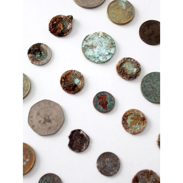 This is a collection of vintage oxidized coins. A remarkable display, each coin shows beautiful corrosion and patina in...