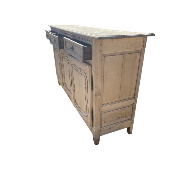 The dresser dates around 1760-1780 and is original apart from it having been bleached.