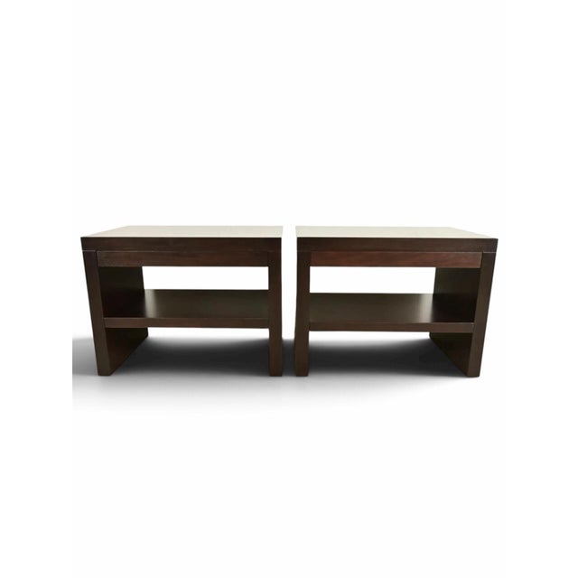 Barbara Barry for Baker Furniture two-tier bedside tables or nightstands. Each side table features a sliding pull out...