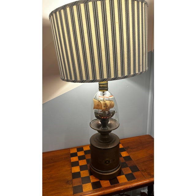 Adorable Midcentury Ship in a Bottle Lamp with Newly Recovered Barrel lampshade in Schumacher Birdie Ticking in Indigo....