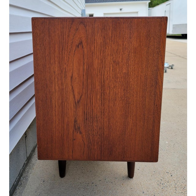 This is a stunning vintage mid century Scandinavian (Danish) teak credenza sideboard. This is unsigned but very well built...