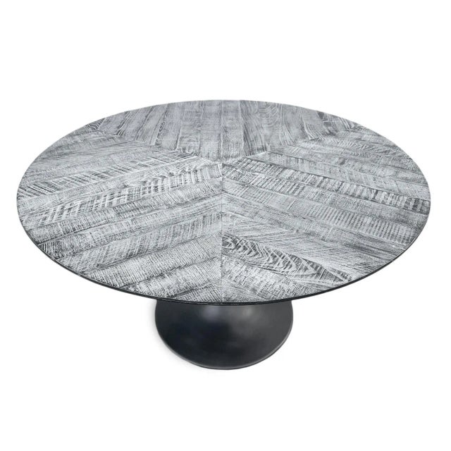 Round grey salvaged wood top dining table with black iron pedestal base. Beautiful parquet pattern top with light to dark...