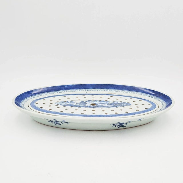 A blue and white Chinese export oval tray and strainer, circa 1900.