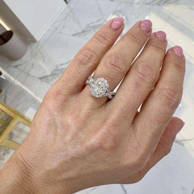 Gender: Ladies Metal Type: 18K White Gold Ring Size: 6.5 Weight: 6.45 grams One ladies 18K white gold diamond engagement...