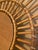 A beautiful vintage-style rattan sunburst wall mirror, featuring an intricate handwoven design and a striking sculptural...