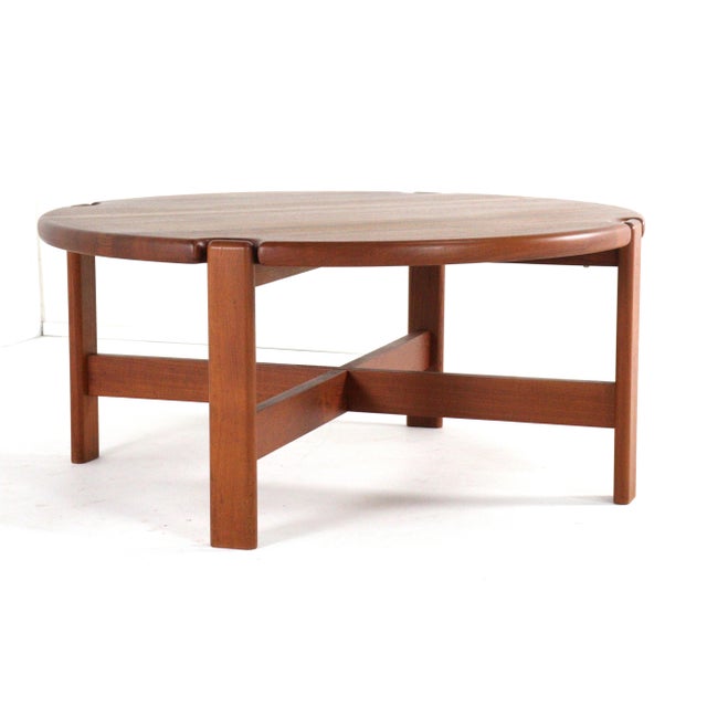 This generously sized, timeless solid wood coffee table is attributed to designer Niels Bach. Its beautiful round top and...