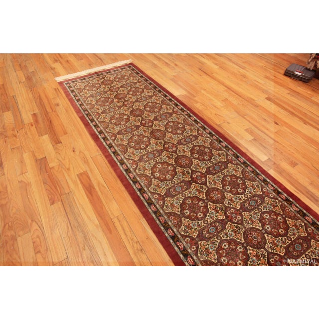 Magnificent Fine Intricate Floral Vintage Persian Silk Qum Hallway Runner Rug, country of origin: Persian Rugs, Circa...