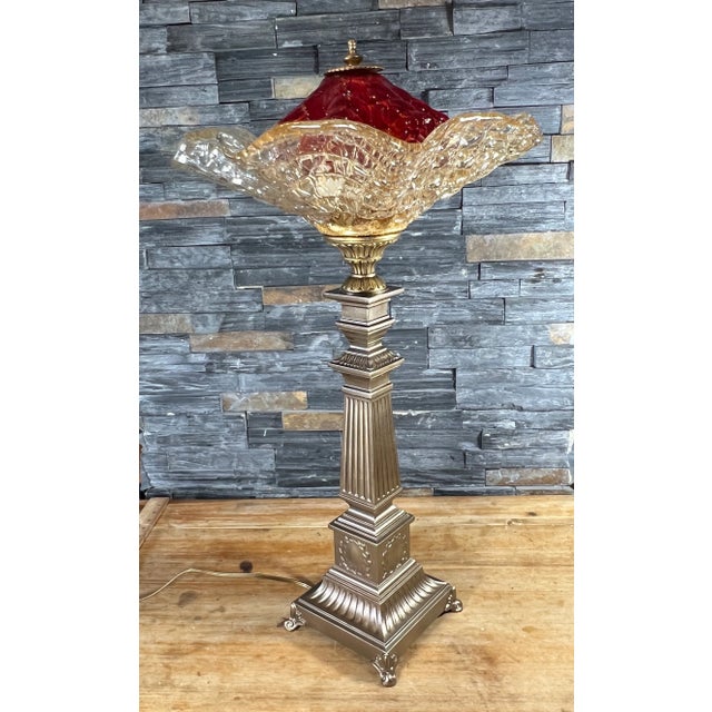 Impeccable and uniquely crafted, this torchiere lamp seamlessly blends vintage Stiffel brass lamp components with hand-...