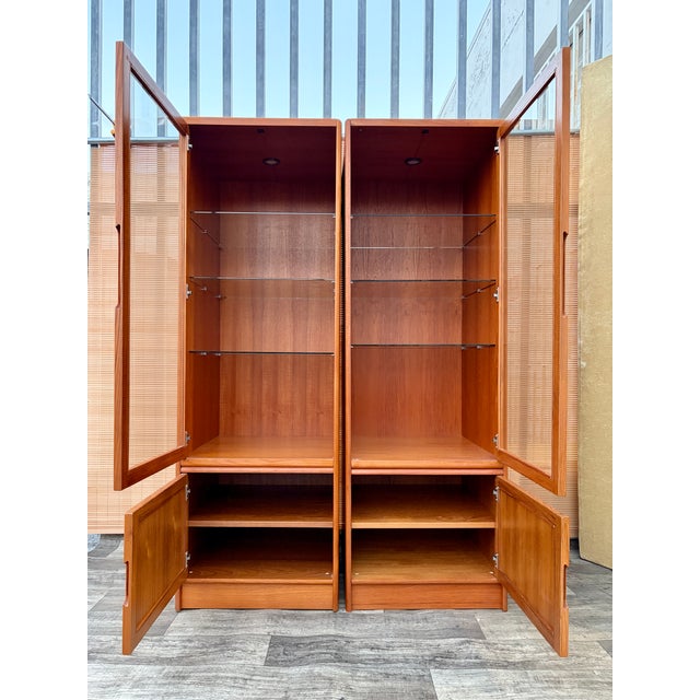 Wood A Pair of Mid-Century Modern Danish Lighted Curio Display Cabinets by Sun Cabinet. Circa 1970s For Sale - Image 7 of 18