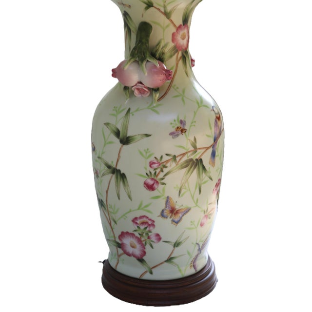 A wonderful hand painted, porcelain Wildwood Lamp. I love the use of flower buds as handles, the intricately painted...