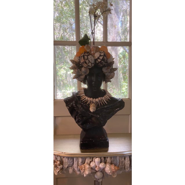 Shell Encrusted Black Bust and Planter by Artist, Fancy - May River Neptune. There is an opening at the top for housing a...