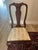 Elegant set of 8 Henkel Harris solid cherry wood dining chairs including 2 armchairs and 6 side chairs. These chairs are...