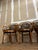 Up for consideration is a beautiful vintage collection of floral cushioned bentwood looped arms dining chairs. These would...