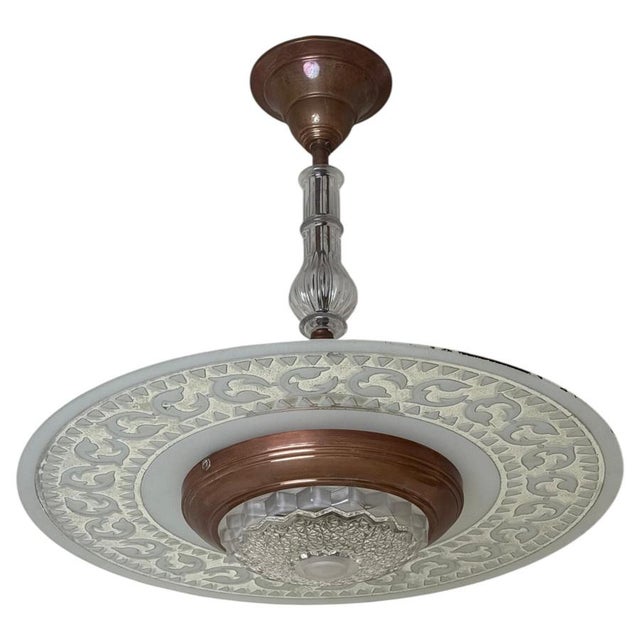 This is one of the most beautiful pendant lamps from the French manufacturer Ezan from the 1930s, don't you think? The...