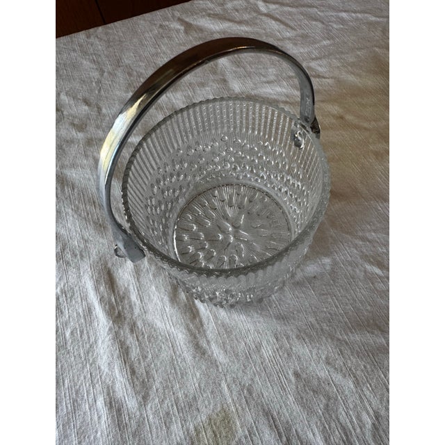 Add a mid century touch to your next get together with this mini ice bucket.