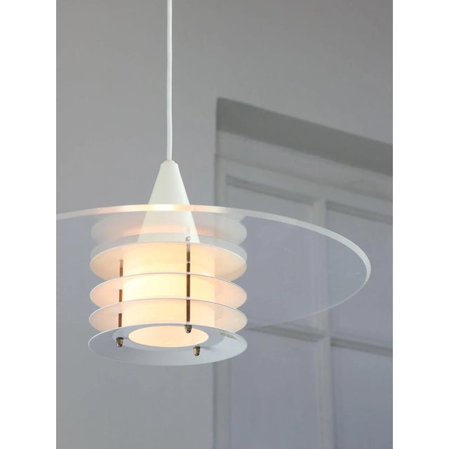 Total height of the lamp is adjustable, length of the cable alone is 140cm and can be shortened to your preference. Takes...