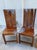 A set of 4 dining or side chairs in hand built from the hard Acacia wood species and decorated in dripped steel metal by a...