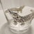 Bring a touch of vintage Hollywood Regency flair to your home bar with this striking alligator glass ice bucket. Perfect...
