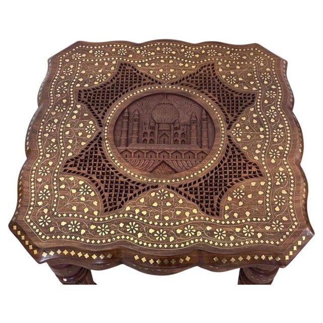 A highly decorative pair of Anglo-Indian side tables, finely handcrafted from richly grained rosewood and combining...