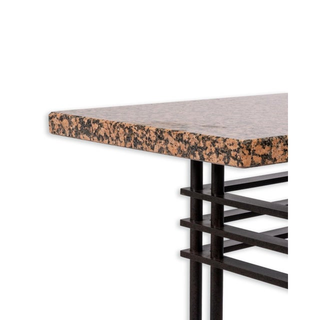 This striking console table, attributed to French designer Jean-Michel Wilmotte for Mirak, exemplifies a refined balance...