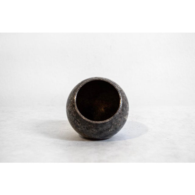 Silver-plated metal vase. Designer: Lino Sabattini Manufacturer: Argenterie Sabattini 1970s This piece has an attribution...