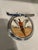 Nice, hand painted porcelain cheese plate with surrounding sterling silver rim. The rim has the sterling mark on the...