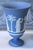 Stunning Wedgwood Blue Jasperware footed pedestal vase featuring the classic “Sacrifice” motif. This elegant 7 1/2-inch...