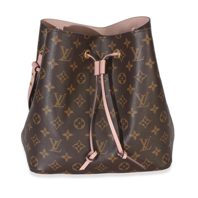 Comes with papers. Item #: 154363 Interior Material: Canvas Size: MM Features Interior: Two gussets. one zip pocket...