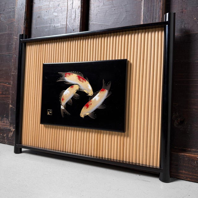 This refined wall panel is executed in Wajima lacquerware and combines a clean, graphic design with warm materials....