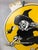 Vintage mid-century Halloween oversized flying witch cardboard die cut wall decoration featuring a classic witch soaring...