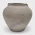 Charged with the humble task of storing dry goods, this small earthenware jar was hand-shaped in the early 20th century...