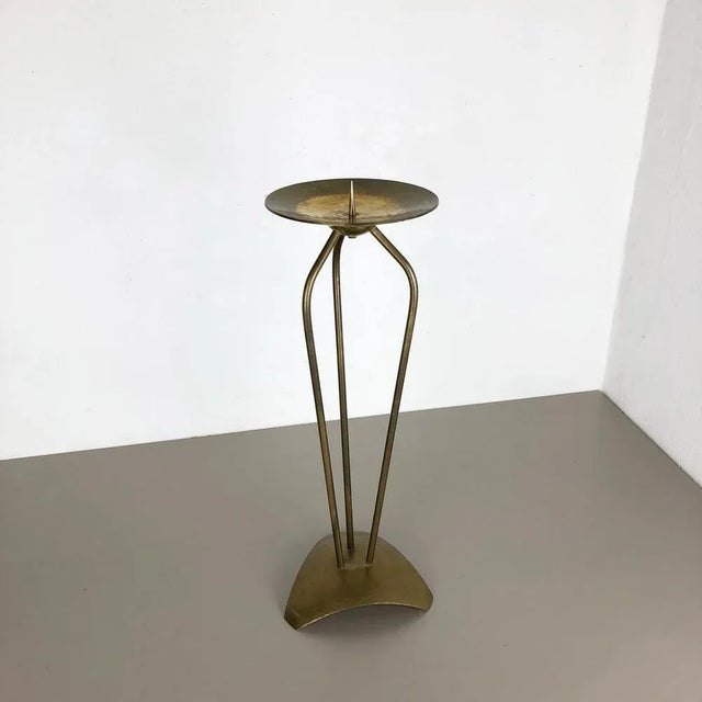 Article: Sculptural floor candleholder Origin: Germany Material: Solid brass Decade: 1950s This original super large...