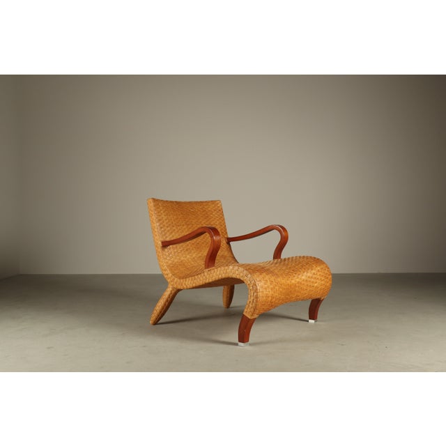 This rare pair of lounge chairs belongs to the Compagnia delle Filippine collection, designed by Antonio Citterio in 1993...