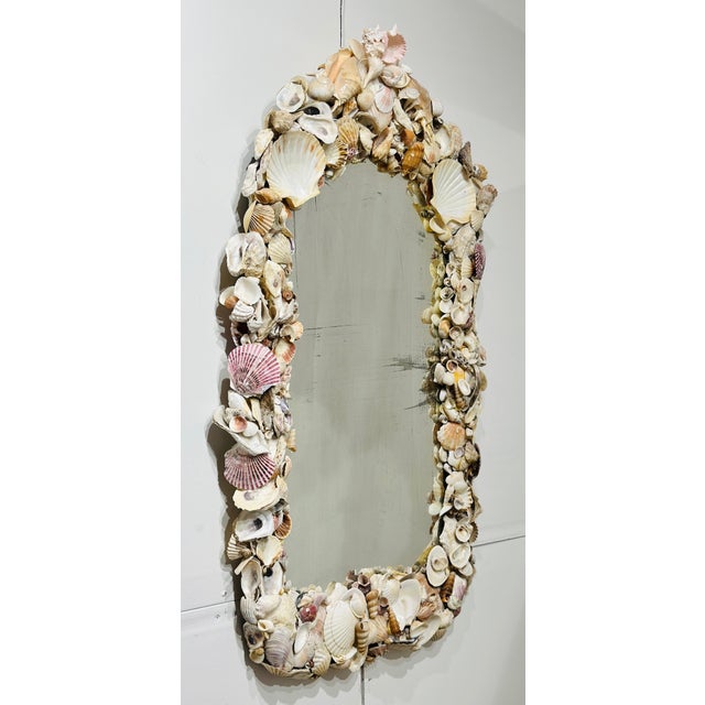 Stunning antique seashell wall mirror. Intricate details.