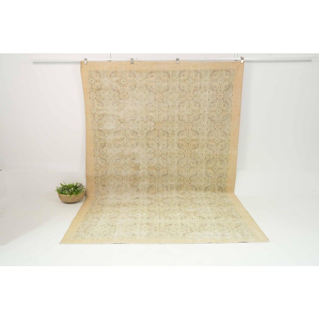 Vintage Hand-Knotted area rug is a semi-antique vintage area rug. The '70s Eastern region of Anatolian's unique rug is...