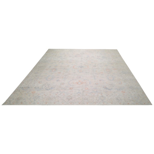 Hand-knotted with care using traditional rug making techniques, this wool rug blends timeless craftsmanship with a modern...