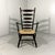 Rustic brutalistic arm chair. Beautiful shaped dark wooden frame with a high ladder back, rush seat. Comfortable seat....