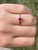 The Nances Creek: Ladies White Gold Ruby Promise Ring. Crafted in polished white gold, this ladies promise ring centers on...